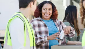 Two people helping out at a food pantry.