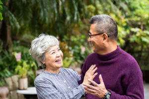 Older asian couple smiling